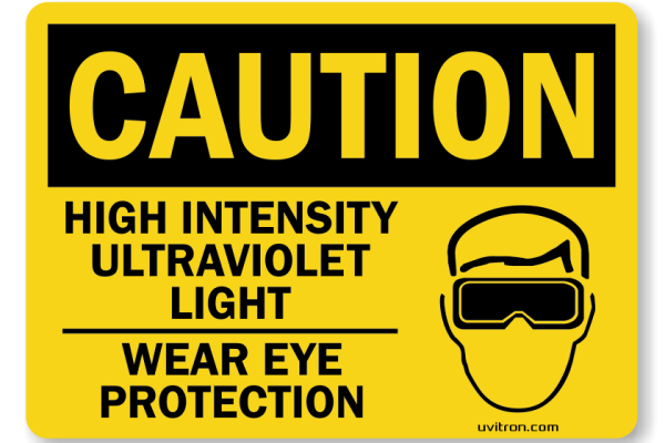 UV caution sign with man wearing goggles