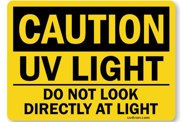 warning sign that says "caution UV light"